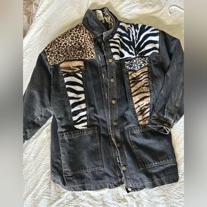 Ladies Jean jacket with animal print detailing.